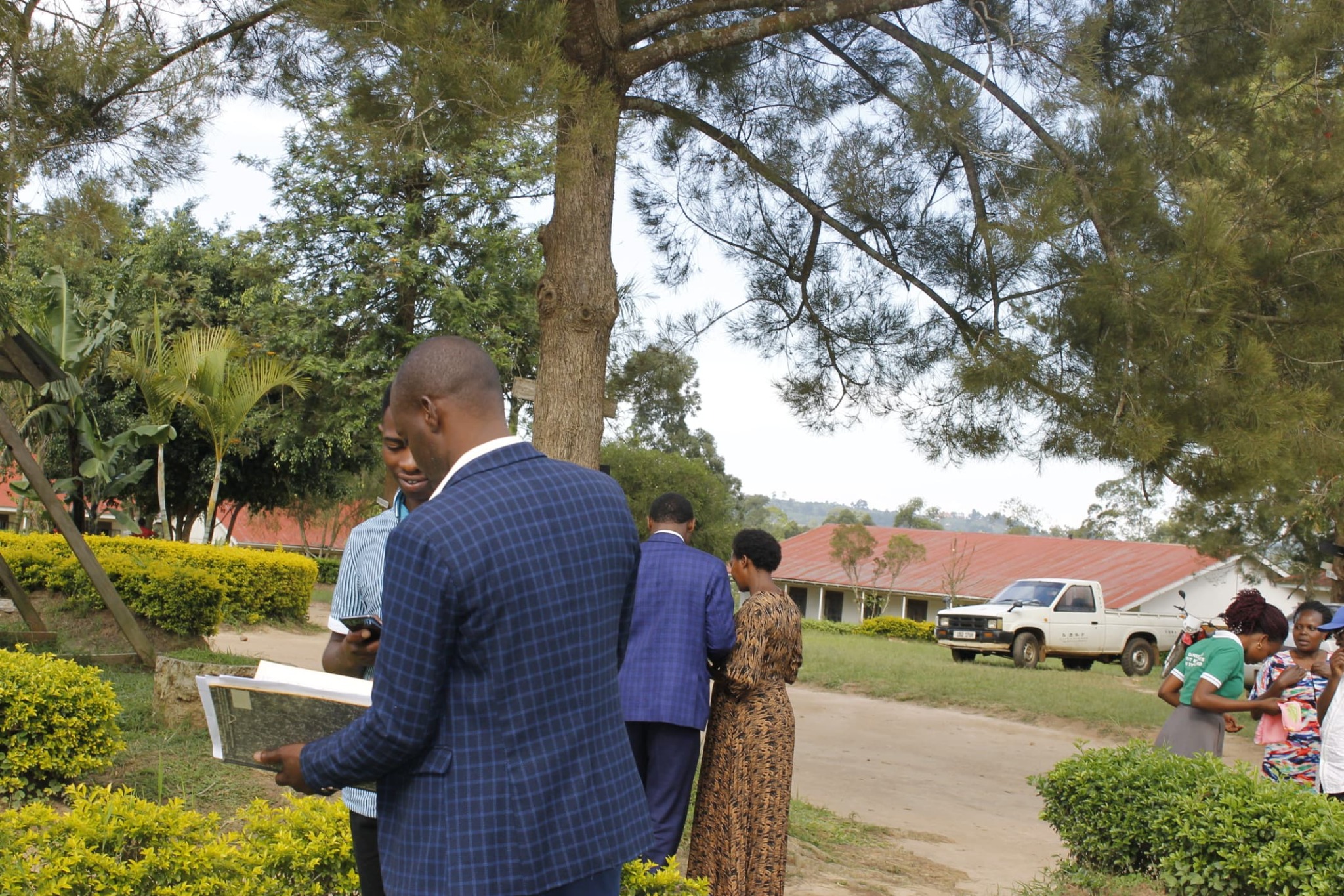 Visitors touring the Nyabiteete Secondary School campus